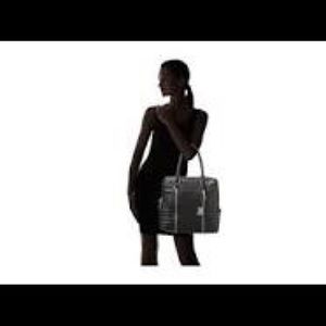 - uSEd gorgeous handbag by Rachel Zoe